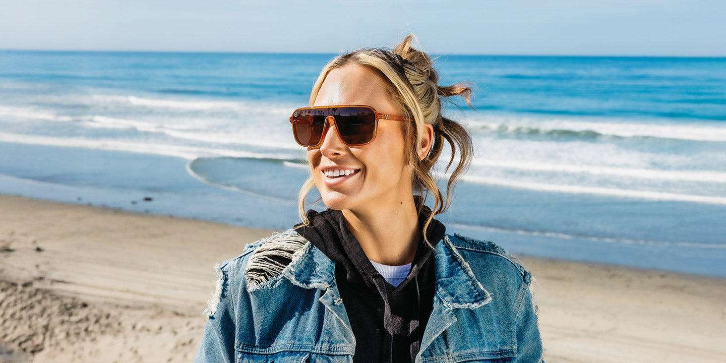 women in brown Blenders Eyewear sunglasses.